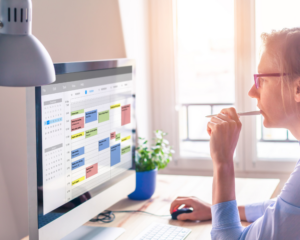 Woman Using Effective Time Management Strategies for Freelance Writers